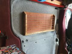 the back end of an old guitar case