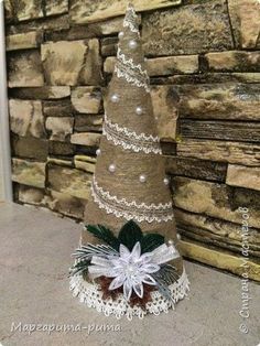 a small christmas tree made out of burlock