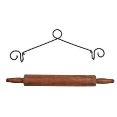 a wooden rolling pin hanging on a metal rod with a black string attached to it