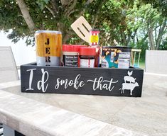 "This is for the box only. No food, skewers, mason jars included Dimensions are 15\" Long x 7\"Wide x 3.5High Fill this box with your favorite BBQ supplies and give this as a gift for any occasion!  I'd smoke that BBQ Box is perfect for family gatherings, camping or just hanging out at home. Who doesn't love grilling and having a BBQ. This way they will be organized and displayed beautifully! The letters are laser cut wood to give a precise 3 dimensional look. This listing includes the box and 3 Bbq Caddy, Caddy Camping, Raffle Gift Basket Ideas, Auction Gift Basket Ideas, Food Skewers, Bbq Bar, Bbq Supplies, Farmhouse Storage, Raffle Basket