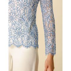 Add a bit of femininity to your look with the ruffle round-neck lace top. It features a long sleeve form, a ruffle neck, and lace fabric. It perfectly matches everyday jeans and skirts for a weekend casual look. A lace top puts a feminine spin on any day or night look with a charming feminine silhouette. Good options for parties, sweet dating, shopping, festivals, banquets, office outfits, casual wear, and daily outfits. Spring Lace Top With Scalloped Edges, Fitted Lace Top With Scalloped Edges, Elegant Crew Neck Lace Top With Lace Trim, Elegant Long Sleeve Lace Top With Scalloped Edges, Elegant Long Sleeve Scalloped Lace Top, Spring Lace Tops With Scalloped Edges, Spring Lace Top With Crew Neck And Lace Sleeves, Long Sleeve Tops With Scalloped Lace For Evening, Scalloped Lace Long Sleeve Tops For Evening