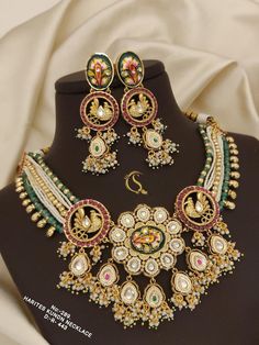 Description :- Kundan Jewelry,Polki Ranihaar Long Necklace,Gold Plated Indian Wedding Jewelry Sets,Bollywood Fashion Jewellery,Pakistani Bridal Jewelry Set Gift yourself a royal look with this perfectly crafted kundan necklace set from Manalisstudio. Crafted with high quality kundan stones and pearls, it is impressive in design. The green enamel artwork adds perfect texture to the design. Perfect for weddings and festivities, this antique necklace set should be put on with your favorite sari or lehenga. 100% Satisfaction. Long Lasting Plating, High-Quality Stones. Gifting :- This necklace and earring set comes in a beautiful manalisstudio gift box, making it an ideal gift for birthdays, weddings or anniversaries. Occasion :- Perfect choice for any Indian occasion. Care :- It is advisable t Ranihaar Gold Indian Jewelry, Polki Long Necklace, Long Kundan Necklace, Antique Necklace Set, Long Necklace Gold, Pakistani Bridal Jewelry, Indian Wedding Jewelry Sets, Kundan Necklace Set, Gift Box Making