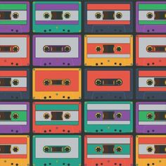 colorful cassette tapes are arranged in rows on a black background