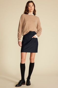 This paneled mini skirt will be a standout in your wardrobe. It features patch pockets on the front for interest and a wide matching belt to accentuate the waist. Our stylist loves it with bare legs and loafers or tights and high boots. DESIGN- Slim fit. Size up for a more relaxed look.- A paneled mini skirt with fitted waist and patch pockets on the front.- Detachable wide belt with fabric covered buckle, hidden side zipper.- Length: 17 5/8" FABRIC & CARE- 50% polyester, 50% RWS wool- Lining: 1 Business Casual Relaxed Skirt With Pockets, Fall Mini Skort For Workwear, Fall Pencil Skirt Skort For Workwear, Fall Workwear Mini Skort, Fall Workwear Pencil Skirt Skort, Blue Mini Skirt With Pockets For Fall, Blue Pencil Skirt For Workwear In Fall, Blue Fall Pencil Skirt For Work, Fall Mini Skirt With Pockets For Work