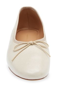 This ballet flat crafted from lambskin leather with a glove-like fit and a higher vamp is an updated version of the iconic silhouette. Leather upper, lining and sole Made in Italy Women's Shoes Elegant Evening Ballet Flats With Textured Sole, Chic Slip-on Ballet Flats In Calf Leather, Chic Calf Leather Slip-on Ballet Flats, Evening Ballet Flats With Textured Sole, Textured Sole Ballet Flats For Evening, Classic Slip-on Calf Leather Ballet Flats, Elegant Calf Leather Flats For Fall, Calf Leather Ballet Flats With Almond Toe, Slip-on Calf Leather Ballet Flats With Almond Toe