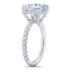 a cushion cut diamond engagement ring with side stones