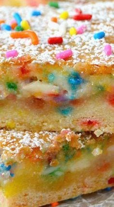 two pieces of cake with sprinkles on top