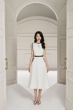 Crafted from a blend of luxurious linen and cotton. Cut for a flattering A-line silhouette, it offers an elegant drape and a medium-weight feel. Perfect for any occasion. Chic White A-line Linen Dress, Classic White Sleeveless Midi Dress, Elegant A-line Sleeveless Dress For Work, Classic White A-line Sleeveless Dress, Elegant White Sleeveless Midi Dress, Elegant White Sleeveless Beach Dress, Elegant H-line Sleeveless Summer Dress, White A-line Cocktail Sleeveless Dress, Elegant White Lace Sleeveless Dress