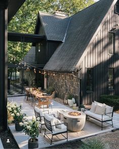 an outdoor patio with seating and tables