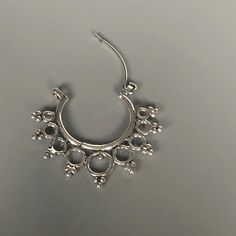 ONE PAIR of Indian style sterling silver ethnic hoops. Dimensions: 24 x 26 mm These earrings are made of 925 hypoallergenic sterling silver. Sent in a gift box. I can include a personal message from you if needed You are welcome to contact me at... bhavnakwintra1956@gmail.com For more beautiful pieces from my shop, please browse 👇 TOE RINGS: https://www.etsy.com/your/shops/TheSilverGame/tools/listings/section:27020628,view:table EAR HOOPS: https://www.etsy.com/your/shops/TheSilverGame/tools/lis Silver Nickel-free Nose Rings, Nickel Free Silver Metal Nose Rings, Silver Pierced Metal Nose Rings, Nickel-free Silver Metal Nose Ring, Sterling Silver Hoop Plug Earring, Silver Single Small Hoop Plug Earring, Unique Silver Nickel-free Hoop Earrings, Unique Sterling Silver Hoop Earrings For Pierced Ears, Unique Metal Hypoallergenic Hoop Earrings