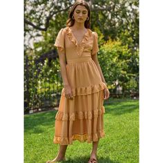 Flaunt your style in this tiered, ruffled midi dress- a daring vacation look that'll make you stand out! With its short, ruffled sleeves, you'll have full freedom to take on your next journey with confidence and flair. Moedled in size S Vacation Looks, Midi Ruffle Dress, Ruffled Sleeves, Women Clothing Boutique, Boutique Clothing, Dress Collection, Latest Fashion Trends, Best Sellers, Trendy Outfits