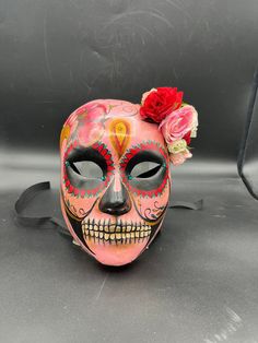 Mexican Skull This mask is a traditional and original papier-mache Venetian mask, handmade and decorated in our Atelier in Venice. It is perfect for any masquerade party, Halloween costume, pro or event in Venice or elsewhere during Carnival. This mask can be gently bent to form to your face and ties in the back with two soft matching ribbons. Size: one-size Colors: multicolor Each mask is an original design and is decorated by hand in the in Venice. Our decorators use techniques typical of the Skull Female, Venice Mask, Mexican Skull, Mexican Skulls, Venetian Mask, Skull Mask, Costume Masks, Decoration Originale, Beautiful Mask