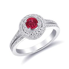 At 0.52 carats, this round brilliant spinel has an unmatched red color. Set on a wreath of diamonds the ring has an illusion of a both a bigger stone plus they look beautiful and sparkly. The diamonds that run onto the band of the ring lays all the importance on the centrally set spinel.  Order online info@jupitergem.com Formal Red Diamond Ring With Pave Setting, Round Diamond Ring With Center Lab-created Ruby, Diamond Ring With Center Stone And Lab-created Ruby, Red Rings With Pave Setting, Classic Ruby Ring With Pave Setting, Red Pave Setting Rings, Classic Red Diamond Ring With Halo Setting, Classic Red Diamond Ring With Pave Setting, Red Diamond Rings With Pave Setting