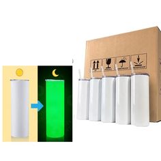 an image of a green light in front of a cardboard box and six white cylindrical cylinders