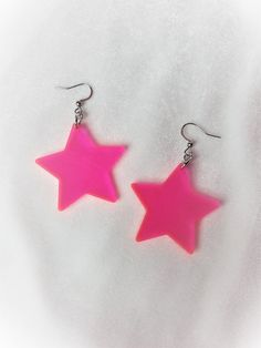 "Choice of sterling silver .925 or surgical stainless steel Approximately 1.5\" wide, and 2.5\" long from top of metal hook These awesome hot pink stars are UV reactive that glow real nice when in the black light. They are still hot pink while not near a black light, please check out the pictures for reference! Bring out the inner retro star in you! :) This product is made to order, colors may appear slightly different Care: the metal and acrylic can be cleaned with a light cleaner Each order is Neon Pink Earrings, Pink Assessories, Black And Hot Pink Outfits, Hot Pink Clothes, Hot Pink Accessories, Hot Pink Outfit, Hot Pink Earrings, 80s Earrings, Pink Accessories