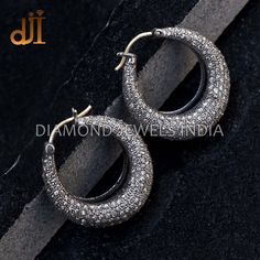 925 Silver Pave Diamond Huggie Hoop Earrings Fashion Jewelry EAMJOS-849 Pave Diamond Earrings. Diamond Silver Earrings. Silver Hoop Earrings.  Huggie Hoop Earrings.  925 Silver Diamond Earrings. Here Are Some Amazing Ways To Take Care Of Your Precious Diamond Jewelry. Always. * Apply lotion, cosmetics, hairspray, and perfume before dressing in jewelry. * When undressing, wipe each piece with a clean soft cloth to remove oils and perspiration. * Store in a fabric-lined box, separately or individu Sterling Silver Small Hoop Jewelry With Diamond Accents, Sterling Silver Huggie Jewelry With Pave Setting, Fine Jewelry Hoop Earrings With Pave Setting, Sterling Silver Hoop Diamond Earrings, Classic Sterling Silver Hoop Earrings With Pave Setting, Dazzling Small Hoop Silver Jewelry, Dazzling Silver Small Hoop Jewelry, Silver Diamond Cut Huggie Jewelry, Small Hoop Sterling Silver Jewelry With Diamond Cut