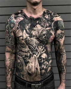 a man with lots of tattoos on his chest