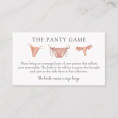 a business card with two bras on it and the text, the fancy game