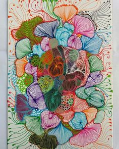 a colorful drawing of flowers on a white background