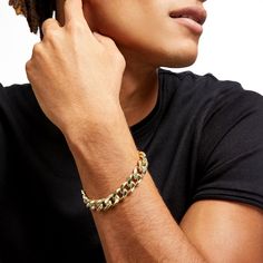 Keep your attire looking fresh and up-to-date with minimal effort when you wear this solid 14K gold curb chain bracelet. Fashioned in solid 14K gold This classic curb chain features a 12.5mm-wide design for a bolder look. The 9.0-inch bracelet secures with a lobster claw clasp. Cuban Link Chain Bracelet With Solid Link Construction, Yellow Gold Cuban Link Bracelet With Solid Construction, 14k Gold Cuban Link Bracelet For Everyday, Gold Chain Cuban Link Bracelet For Everyday, 14k Gold Cuban Link Chain Bracelet, Classic Cuban Link Bracelet With Gold Chain, Yellow Gold Cuban Link Bracelet For Everyday, Classic 14k Gold Cuban Link Chain Bracelet, Modern Cuban Link Gold Chain Bracelet