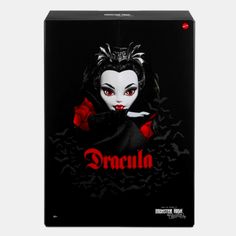 a box with an evil doll on the front and dracula in the middle, surrounded by bats