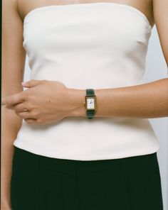 Meet The Diana Strap, one of the four interchangeable straps available in our Icon Watch Collection. The Green Diana Strap is made with green alligator style leather. The unique green strap is beyond chic and versatile. It evokes a touch of sophistication to any outfit you put on! Also available in the following color ways: Kelly - Black Red - Monroe Brown - Bruni Made with genuine leather. Please note - to wear the finished piece, you will also need to purchase The Icon Watch. Straps are sold s Chic Everyday Watches, Leather Strap Jewelry For Everyday Use, Everyday Jewelry With Leather Strap, Classic Green Watch For Everyday Use, Elegant Everyday Watches With Bracelet Strap, Timeless Business Jewelry, Elegant Green Rectangular Watch, Elegant Green Rectangular Watches, Elegant Green Business Watch