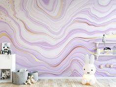 a purple marble wallpaper in a child's room with a white rabbit sitting on the floor