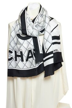 Chanel black and white silk scarf. On the scarf are the Chanel letters printed in 3D. The trim is black and has rolled edges. It is brand new. White Silk Scarf, White Camellia, Chanel Black And White, Logo Scarves, Christian Lacroix, Blue Pearl, Chanel Black, White Silk, Vintage Chanel