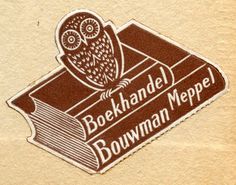 an owl sitting on top of a book with the words bockhandel, bowman