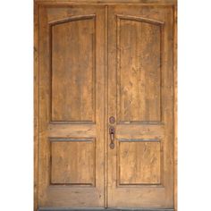 an old wooden door with two side panels