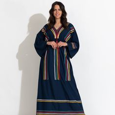 Feel the breeze in this Boho kaftan made of Egyptian cotton. It's soft, breathable and perfect for summer parties, beach days and home gatherings. You can wear this Kaftan practically anywhere and for any occasion. You can dress it up with a pair of heels and strut like an Egyptian queen in any gathering, resort, or party. Or you can dress it down with a pair of sneakers/slippers and walk around your home feeling extremely free and comfortable while looking effortlessly stunning in your house dr Multicolor Long Sleeve Abaya For Vacation, Blue Cotton Kaftan For Loungewear, Blue Cotton Kaftan For Vacation, Blue Cotton Kaftan For Beach Cover-up, Casual Long Blue Kaftan, V-neck Thobe For Eid Vacation, Blue Casual Kaftan For Loungewear, Blue Casual Kaftan With Kimono Sleeves, Long Blue Cotton Kaftan