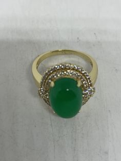 Vintage Lucky Green Nephrite Jade Gold Filled Cocktail Ring Large green nephrite jade gold filled Vintage ring, does not tarnish Size 5.5, 6, 7, 7.5, 8.5 All rings are shipped free in the US in a nice gift box. Check out our over a THOUSAND great reviews Engraving is $4 per letter and is not always perfect depending on the piece. It can take a few days if the jeweler is busy. This is payable to Paypal Judithsltd@gmail.com Green Oval Rings With Stone Setting, Oval Green Rings With Stone Setting, Green Oval Stone Setting Rings, Oval Gold Emerald Ring With Stone Setting, Formal Gold Jade Rings, Fine Jewelry Gold Rings With Jade, Gold Formal Emerald Ring With Chrysoprase, Gold Jade Rings In Fine Jewelry Style, Gold Chrysoprase Rings For Anniversary