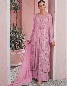 Rose Pink Sharara style Suit Faux Georgette Salwar Kameez in Embroidery, Sequins & Lace Work:Arabic Attire #salwarkameezimage #salwarkameezstore #salwarset #churidarsuitdesign #indiansalwarsuitsdesigns #trendysuitsforladies #salwarkammez #suitsinindia #newindiansuits #buysalwarsuitsonline #indiansalwarkameezonlinefreeshipping #designersalwarkameezonlineusa #designersalwars #newshalwarkameezdesign Green Sharara, Georgette Palazzo, Palazzo Style, Latest Salwar Kameez, Pakistani Salwar, Pakistani Suit, Punjabi Outfits, Georgette Dupatta, Desi Wear