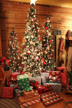 a christmas tree with presents in front of it