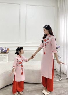 🌻This Set includes: Mom: 1 ao dai top and 1 pants Baby girl : 1 top and 1 pants 🌻 Stretchy level: 0/10 🌻 The measurement of this ao dai (long dress) is in Vietnamese size (American size tends to be bigger for the same size). Please LOOK AT THE SIZE CHART CAREFULLY BEFORE ORDERING. There might have some chalk writings on the fabric due to making process. These marks can be washed away easily. 🌻🌻No returns or exchanges Buyer can contact seller about any issues with an order. 💜 Thank you very Pink Spring Flowers, Matching Mom, Pink Spring, Lunar New Year, Mom Daughter, Year 2024, Lunar New, Dress Clothes For Women, Chalk