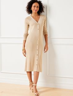 The easiest and prettiest sweater dress you'll own this season. Crafted from sublimely soft ribbed fabric with easy button front closures. A polished work-to-weekend style. Features Sheath Dress V-Neck Long Sleeve Snap closure Hits Below Knee Imported Fit: Misses: 41 1/2"; Petite: 39"; Plus: 41 1/2"; Plus Petite: 39" Material: 57% Viscose, 18% Polyester, 13% Nylon, 8% Metallic, 4% Spandex Care: Machine Wash Cold; Only Non-Chlorine Bleach When Needed; Reshape, Lay Flat To Dry; Warm Iron, If Needed | Button Front Ribbed Sweater Dress Talbots Fall Midi Length Sweater Dress With Buttons, Spring Knee-length Sweater Dress With Buttons, Ribbed Button-up Spring Dresses, Spring Ribbed Button-up Dress, Spring Button-up Ribbed Dresses, Button Down Sweater Dress, Pretty Sweaters, Dress With Buttons, Button Down Sweater