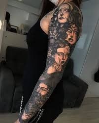 a woman with a tattoo on her arm