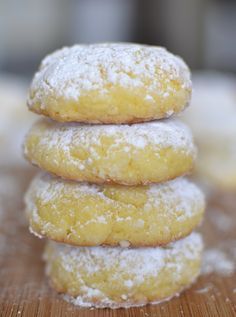 three sugar covered donuts stacked on top of each other