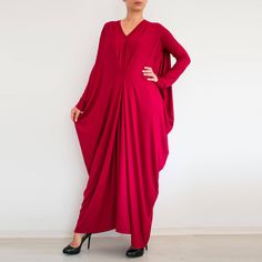 "Oversized draped maxi dress. Relaxed fit. Interesting design. Long sleeves Perfect for plus sizes The color on the photos is Apple Green color from our color chart. The model is 155cm tall and size L/XL. The dress has 3/4 sleeves. The dress is made to order. It can be made in all sizes, including plus sizes. I will need the length from the shoulder to the bottom hem or your total height. -------------------------- This garment is available in XS-3XL sizes Every garment is made for 170 cm (5\"8' Elegant Oversized V-neck Maxi Dress, Flowy Long Sleeve Maxi Dress For Evening, Spring Maxi Length Abaya, Billowy Long Sleeve Maxi Dress For Party, Summer Flowy Long Sleeve Abaya, Summer Long Sleeve Flowy Abaya, Flowy Long Sleeve Summer Abaya, Flowy Summer Abaya, Flowy Floor-length Maxi Dress With Draped Sleeves