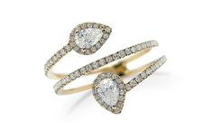 two pear shaped diamond rings on top of each other, one with a double band