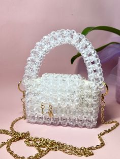 Mini Crystal bag, handmade. There is also a pouch for storing your handbag. Length 5 in Width 3 in Height 3 in(with handle 6 in) Pearl Handle Tote Bag For Gift, Top Handle Box Bag With Removable Pouch, Gift Tote Bag With Pearl Handle, Top Handle Box Bag With Detachable Handle, Gift Box Bag With Detachable Top Handle, Detachable Handle Top Handle Box Bag Gift, Trendy Bags With Pearl Handle For Gifts, Trendy Handheld Box Bag Gift, Top Handle Bag As Gift