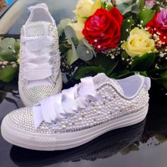 These White Converse Shoes Are Adorned With White Pearls And Clear Gem Stones. They Have White Ribbon Laces With Normal White Replacement Laces And Some Extra Gems Just In Case. Perfect To Wear For Your Wedding, Bridal Shower, Or Bachelorette Party Or Just To Be Fun And Fancy. Woman's Size 8.5, Fit True To Size. Smoke Free Home. Offers Welcome. White Slip-on Party Sneakers, White Slip-on Sneakers For Party, Converse Sneakers With Rhinestones And Round Toe, White Embellished Sneakers For Party, White Embellished Party Sneakers, Bedazzled Converse, White Converse Shoes, Ribbon Laces, Wedding Sneakers