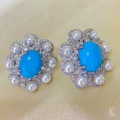 Highlight: Elegant Earrings Product Information OriginJapan MaterialAkoya Pearl, Natural Turquoise, Diamond, and 18k Gold Dimensions1.95 x 1.7 cm Pearl Shaped: Round Size: 3-3.5 mm Quality: AAA Nacre: Very Thick Color: White Luster: Aurora Accessories Metal: 4.9 g of 18k White Gold Other: 1.1 ct SI Quality Natural Diamond and 3.7 ct High-Quality Natural Turquoise Luxury Diamond Earrings In Turquoise, Luxury Turquoise Diamond Earrings, Elegant Turquoise Diamond Earrings, Luxury Turquoise Wedding Earrings, Luxury Multi-stone Earrings, Luxury Blue Gemstone Pearl Earrings, Blue Gemstone Luxury Pearl Earrings, Blue Luxury Pearl Earrings With Gemstone, Luxury Turquoise Cabochon Earrings