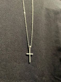 The Serene Cross is a stunning piece that captures the essence of tranquility and divine grace. Crafted by Christians, this cross pendant exudes an elegant simplicity that makes it a timeless accessory. The clean lines and smooth finish give the Serene Cross a sophisticated, minimalist aesthetic, perfect for everyday wear or special occasions. Minimalist Cross Pendant Necklace With Clavicle Chain, Minimalist Clavicle Cross Chain Jewelry, Minimalist Cross Pendant Necklace As Gift, Minimalist Cross Necklace With Clavicle Chain, Minimalist Clavicle Chain Crucifix Jewelry, Minimalist Crucifix Clavicle Chain Jewelry, Silver Minimalist Cross Necklace With Clavicle Chain, Elegant Silver Cross Necklace For Everyday, Elegant Everyday Silver Cross Necklace