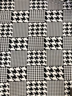 a black and white checkered fabric is shown