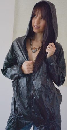 the black womans jacket with trucks is some used but also very stylish !  is of fine fabric with trucks with hooded ! Rain Fashion, Rainwear Fashion, Leather Outfits, Plastic Raincoat, Sauna Suit, Shiny Pants, Spring Jacket, Jackets Women, Seductive Clothes