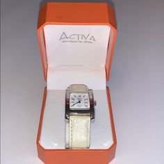 Activa Swiss Watch No. 495494 Water Resistant 30 M With/White Leather Band. New With Original Box White Watches With Diamond Hour Markers As Gift, White Watch Accessories As A Gift, Casual White Watches For Gifts, Casual White Watches As Gifts, White Watches With Diamond Hour Markers And Rectangular Dial, Classic Adjustable White Watch Accessories, Classic White Adjustable Watch Accessories, Casual White Analog Watches, White Analog Watch With Round Dial