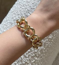 "𝓦𝓮𝓵𝓬𝓸𝓶𝓮 𝓽𝓸 𝓛𝓲𝓸𝓷𝓱𝓮𝓪𝓻𝓽 𝓳𝓮𝔀𝓮𝓵𝓻𝔂 𝓢𝓱𝓸𝓹 ♥ Gorgeous handmade high polished specialty link chain Bracelet crafted in 14K Italian yellow gold. The chain bracelet is a statement piece by itself or can be layered with other bracelets. The bracelet is 7.5\" but if you desire a different length that's not listed below send us a message and we will send you a link. *Please check measurements below, items may appear larger on the screen. MEASUREMENTS Link: 19.5mm x 26.9mm ITEM DET Luxury Metal Bracelet With Chunky Chain, Gold Chunky Chain Bangle Bracelet, Luxury Link Bracelet With Chunky Chain, Yellow Gold Link Bracelets With Chunky Chain, Luxury Chain Link Charm Bracelet, Formal Chunky Chain Bracelet, Luxury Gold-tone Bracelet With Chunky Chain, Luxury Gold-tone Chunky Chain Bracelet, Formal Gold Bracelet With Chunky Chain