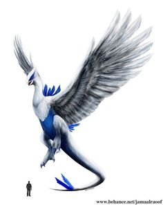 a white and blue bird with wings spread out in front of a man standing next to it