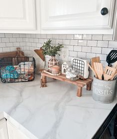 the kitchen counter is clean and ready to be used as a utensil holder